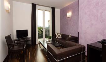 suite-1 king bed, non-smoking, balcony, lounge area, parquet floor