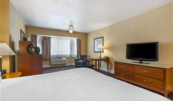 1 kingsize-bett, nichtraucher, kamin, sessel mit ottomane, mikrowelle und kühlschrank, high-speed-internetzugang, blick auf den pool, komplettes frühstück