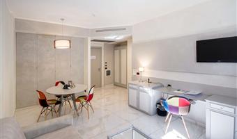 suite - 1 queensize-bett, nichtraucher, separates gebäude, wohnbereich, sofabett, 2 fernseher mit flachbildschirm