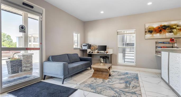 Hall of the SureStay Plus by Best Western Ada in Ada - 54148