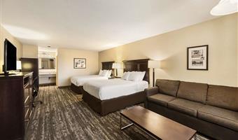 2 queen beds, non-smoking, larger room, sitting area, microwave and refrigerator, wi-fi, full breakfast