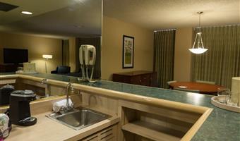 sunset suite - 2 queens, separate living room, sofabed, wet bar, refrigerator, flat screen television, coffee maker