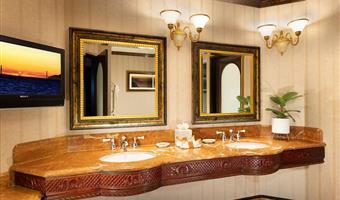 suite-1 king bed, non-smoking, marble bathroom with double vanity, european soaking tub, marble enclosed walk-in shower, refrigerator, wi-fi