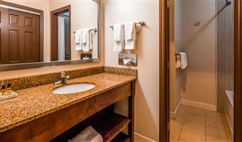 suite-1 king bed, non-smoking, sofabed, jetted tub, water view, microwave and refrigerator, walk in shower, full breakfast