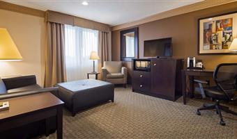 suite-1 king bed, non-smoking, separate living area, sofa, microwave and refrigerator, wi-fi, full breakfast