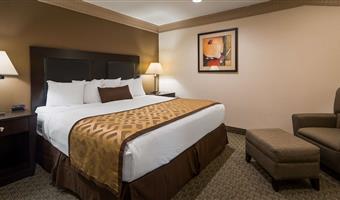 suite-1 king bed, non-smoking, separate living area, sofa, microwave and refrigerator, wi-fi, full breakfast