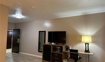 suite-1 king bed, mobility accessible, bathtub, sofa for sitting, non-smoking, full breakfast