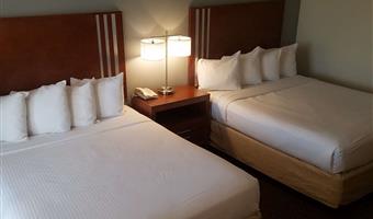 2 queen beds, non-smoking, flat screen television, microwave and refrigerator, high speed internet access, continental breakfast