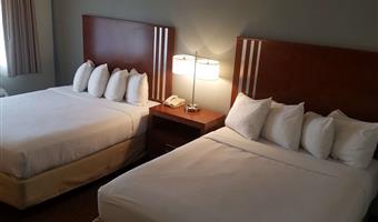 2 queen beds, non-smoking, flat screen television, microwave and refrigerator, high speed internet access, continental breakfast