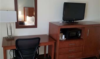 2 queen beds, non-smoking, flat screen television, microwave and refrigerator, high speed internet access, continental breakfast