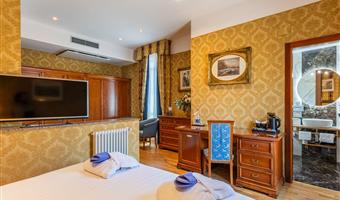 1 king bed, non-smoking, superior room, coffee and tea maker, bathrobe and slippers, wi-fi, 1 bottle of water, shopping card