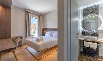 1 king bed, non-smoking, superior room, coffee and tea maker, bathrobe and slippers, wi-fi, 1 bottle of water, shopping card