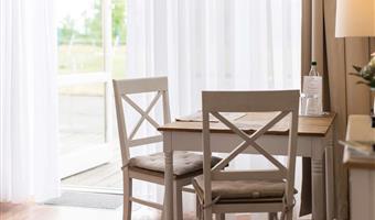 suite-1 double bed, separate living room, sofabed, flat screen television, wi-fi, coffee and tea maker