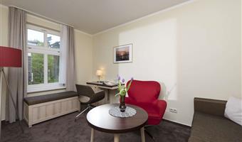 1 double bed, junior suite, separate building, partly with separate living room, bathrobe and slippers, cozy sitting corner, free parking, full breakfast