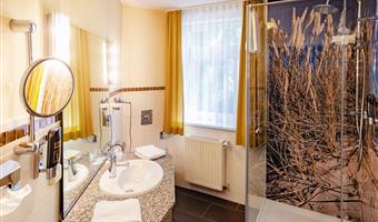 1 double bed, junior suite, separate building, partly with separate living room, bathrobe and slippers, cozy sitting corner, free parking, full breakfast