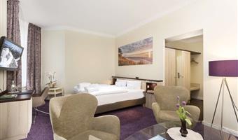 1 double bed, junior suite, separate building, partly with separate living room, bathrobe and slippers, cozy sitting corner, free parking, full breakfast