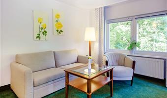 suite-1 double bed, separate building, separate living area, sheltered loggia, bathrobe and slippers, free w-lan, free parking, full breakfast