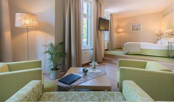 suite-1 double bed, waldschloesschen suite, cozy sitting corner, walk in closet, bathrobe and slippers, free w-lan, free parking, full breakfast