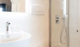 suite-1 queen bed, two bedrooms, sofabed for one person, two balconies, sea view, living room, 2 bathrooms