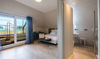 suite-1 queen bed, two bedrooms, sofabed for one person, two balconies, sea view, living room, 2 bathrooms