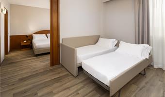 suite-1 king bed, living area, free soft minibar, wi-fi, premium tv channels