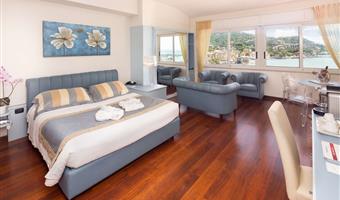 1 queen bed, non-smoking, junior suite, two sofabeds for 1, balcony, sea view, lounge area