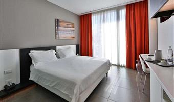 1 king bed, privilege room, wi-fi, digital television, free minibar softdrinks, free garage parking