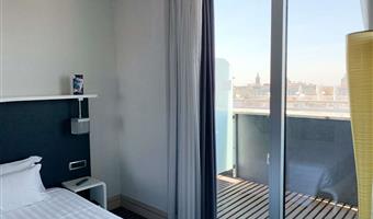 1 king size double bed, junior suite, 35sqm, living room, sofa, terrace, city view, wi-fi, bathrobe and slippers, coffee and tea maker, 1 bottle of water, minibar (free soft drinks), free room service, shopping card