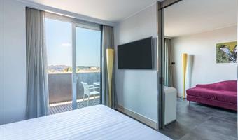 1 king size double bed, junior suite, 35sqm, living room, sofa, terrace, city view, wi-fi, bathrobe and slippers, coffee and tea maker, 1 bottle of water, minibar (free soft drinks), free room service, shopping card