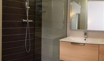 suite-1 king bed, non-smoking room, double sofabed, living area, 2 32 inch led tvs, kitchenette, patio
