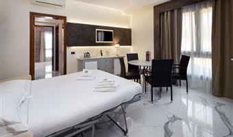 suite-1 king bed, non-smoking, separate building, living area, double sofabed, 2 32 inch led tvs