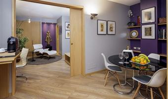 suite-1 king bed, non-smoking, living room, sofa, 2 bathrooms