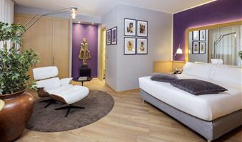 suite-1 king bed, non-smoking, living room, sofa, 2 bathrooms