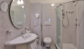 suite-1 king bed, non-smoking, living room, sofa, 2 bathrooms