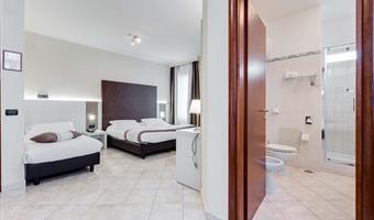 1 queen 2 single beds, family room
