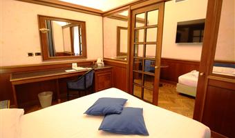 1 queen bed and 2 single sofabeds, quadruple room, high speed wi-fi, safe, kettle