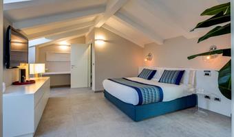 suite-1 king bed, non-smoking, design room, kitchenette, balcony, bathrobe and slippers
