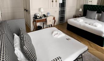 1 queen bed and sofabed for one person, superior room with full breakfast included