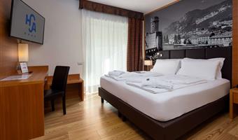 suite-1 cama de matrimonio extragrande, sofá-cama, wi-fi, televisión de pago gratis, bata de baño y zapatillas,  acceso al spa