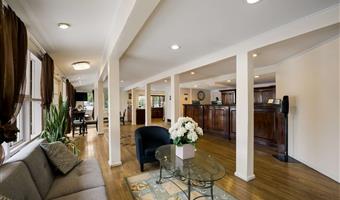 Hall de SureStay Plus by Best Western Woodbury Inn à Woodbury - 33102
