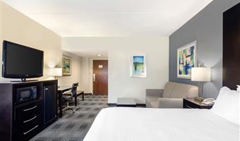 suite- 1 lit king size, non fumeur, chambre séparée, canapé-lit, salon commun, four à micro-ondes et réfrigérateur, petit déjeuner complet