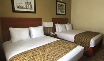 2 lits queen size, non fumeur, four à micro-ondes et réfrigérateur, bureau, wi-fi, petit déjeuner continental