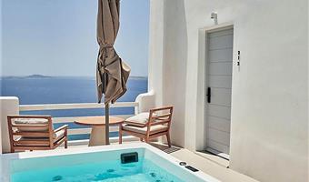 chambre deluxe, avec bain bouillonnant, 1 lit king size, non fumeur,terrasse, vue sur la mer , petit déjeuner complet