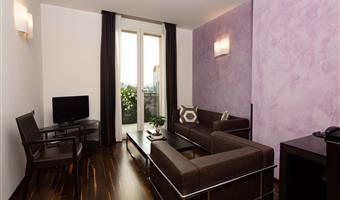 suite- 1 lit king size, non fumeur, balcon, lounge area, parquet