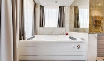 suite spa, 1 lit king size, salon, balcon, vue panoramique