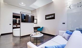 suite- 1 lit king size, lit rond, 40 m², salon, salle de bains avec douche, bain bouillonnant