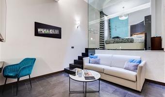 suite- 1 lit king size, lit rond, 40 m², salon, salle de bains avec douche, bain bouillonnant