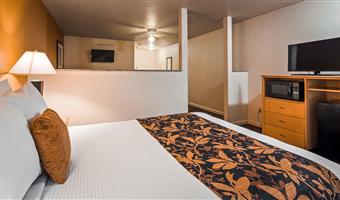 suite -1 letto queen size, ad angolo deluxe in camera, camera grande, microonde e frigorifero, cassaforte, camere non fumatori, colazione completa