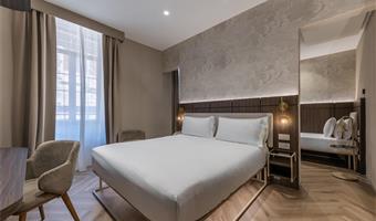 1 letto king, 1 letto singolo, camera deluxe, due bagni