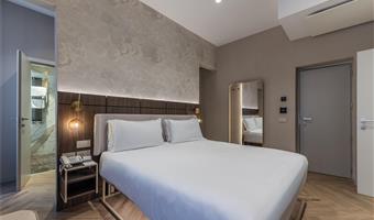 1 letto king, 1 letto singolo, camera deluxe, due bagni